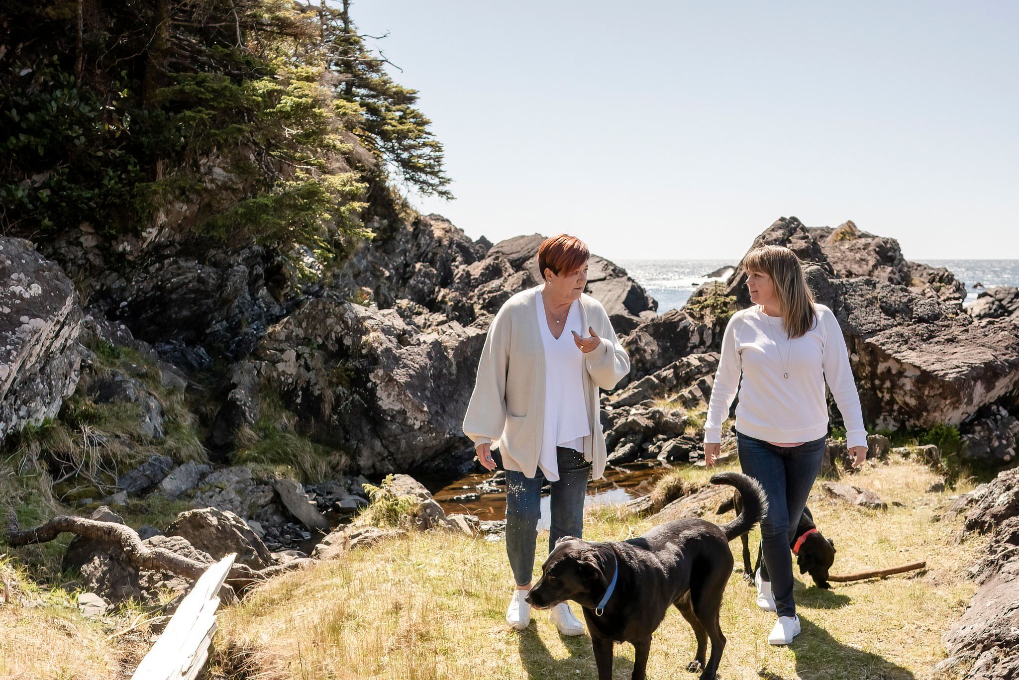 People walking on a Ucluelet beach