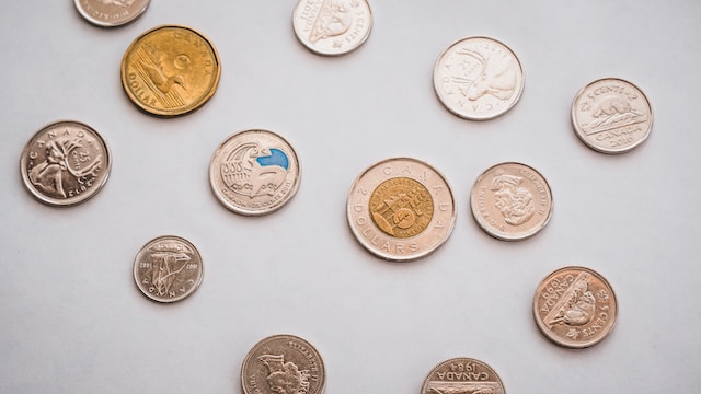 Image of Canadian coins on a white blank surface